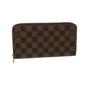 Pre-owned Brunt lerret Louis Vuitton lommebok