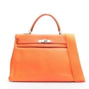 Pre-owned Oransje Hermès Kelly i skinn