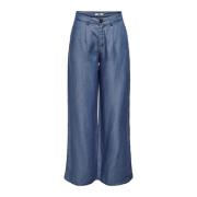 Blå ensfargede bukser med glidelås og knappelukking