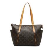 Pre-owned Brunt skinn Louis Vuitton helt