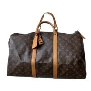 Pre-owned Brunt lerret Louis Vuitton Keepall