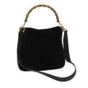 Pre-owned Suede handbags