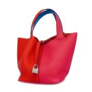 Pre-owned Fabric handbags