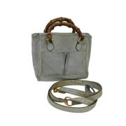 Pre-owned Suede handbags