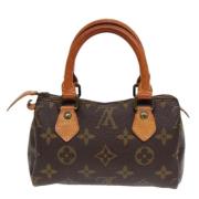 Pre-owned Canvas handbags