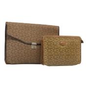 Pre-owned Canvas clutches