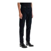 Avslappet passform tapered jeans i knust vask