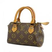 Pre-owned Fabric handbags