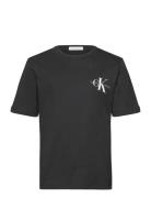 Chest Monogram T-Shirt Tops T-shirts Short-sleeved Black Calvin Klein