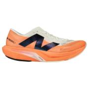 New Balance Løpesko FuelCell Rebel V4 - Varm Mango/Hvit
