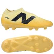 New Balance Tekela V4 Magique FG Energy Rush - Pergament/Svart/Oransje...